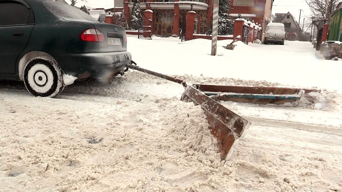 Приспособление для уборки снега на автомобиль